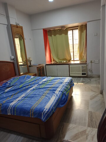 Bedroom in 2 BHK Apartment at Vikas Park CHS, Malad West – for Rent