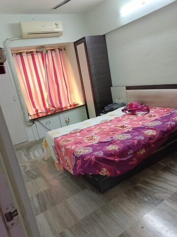 Bedroom in 2 BHK Apartment at Vikas Park CHS, Malad West – for Rent