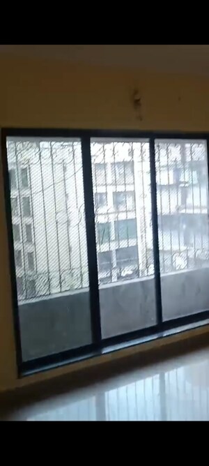 Bedroom in 1.5 BHK Apartment at Unnat Nagar CHS, Goregaon West – for Sale