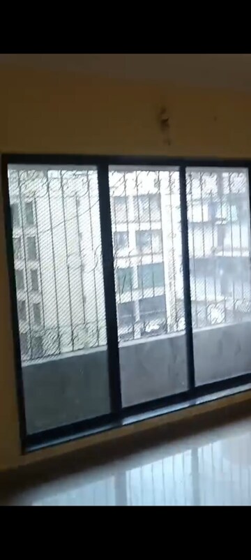 Bedroom in 1.5 BHK Apartment at Unnat Nagar CHS, Goregaon West – for Sale