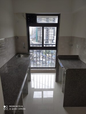 Living Room in 2 BHK Apartment at Parinee Essence, Kandivali West – for Sale
