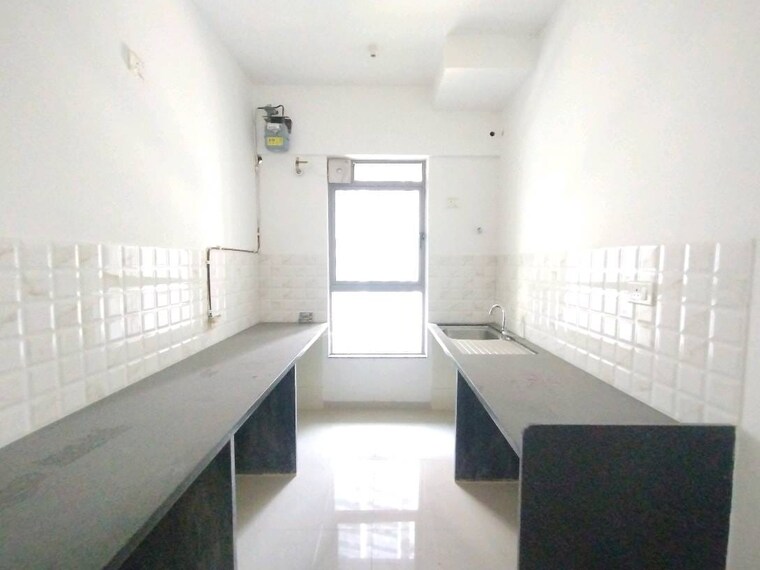 Kitchen, kalpataru-immensa-b 2 Bedroom 632 Sq.Ft. Apartment In Kolshet Road Thane 9602348