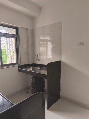 Kitchen in 1 BHK Apartment at BG Shirke Monte Verita, Borivali East – for Rent