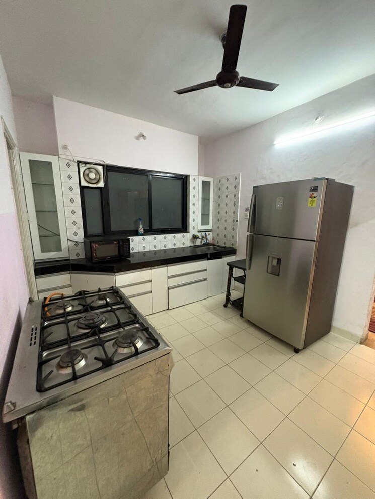Kitchen, oxford-comforts 2 Bedroom 850 Sq.Ft. Apartment In Wanwadi Pune 9602378