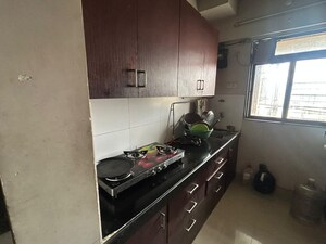 Kitchen in 2 BHK Apartment at Squarefeet Grand Square, Anand Nagar – for Rent