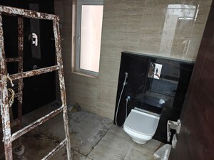 Bathroom in 3 BHK Apartment at Aparna Zenon, Puppalaguda – for Rent