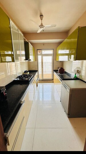 Kitchen in 3 BHK Apartment at Rustomjee La Vie, Majiwada – for Rent