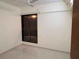 Bedroom in 2 BHK Apartment at Chandak 34 Park Estate, Goregaon West – for Rent