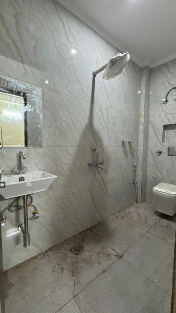 Bathroom in 2 BHK Builder Floor at Chattarpur – for Rent