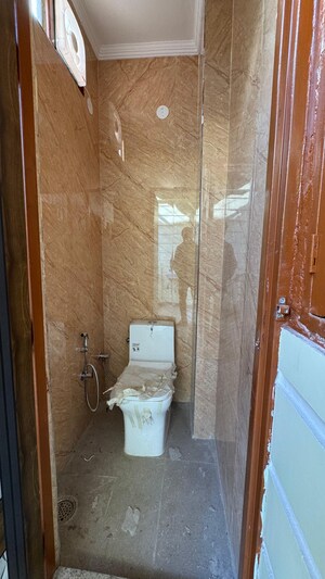 Bathroom in 2 BHK Builder Floor at Chattarpur – for Rent