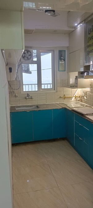 Kitchen in 2 BHK Apartment at Gaur Atulyam, Omicron I Greater Noida – for Rent