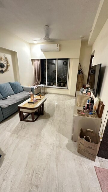 Living Room in 1 BHK Apartment at Rizvi Cedar, Malad East – for Rent