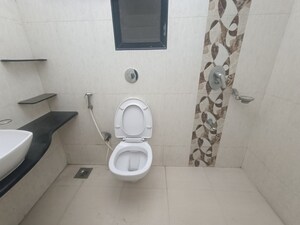 Bathroom in 2 BHK Apartment at Akshar Shreeji Heights, Seawoods – for Rent