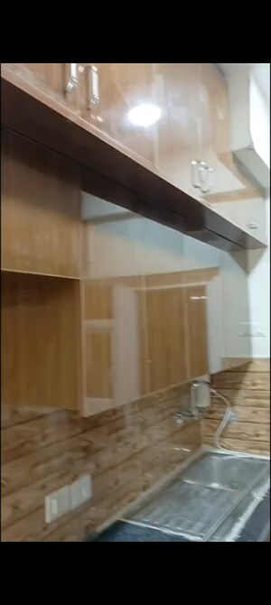 Kitchen in 4 BHK Apartment at Mahagun Mywoods, Sector 16c Greater Noida – for Rent