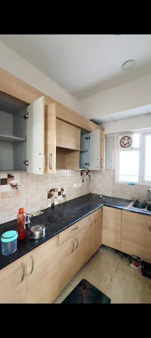 Kitchen in 2 BHK Apartment at Gaur City 2 - 14th Avenue, Sector 16c Greater Noida – for Rent