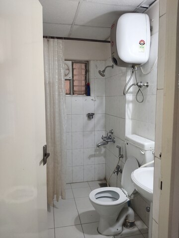 Bathroom in 3 BHK Apartment at Unitech Heritage Estate, Yelahanka – for Rent