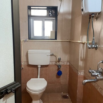 Bathroom in 1 BHK Apartment at Skyline Sparkle, Usha Nagar – for Rent