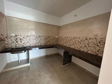 Kitchen in 3 BHK Apartment at Lotus The Address, Moshi – for Rent