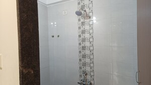 Bathroom in 1.5 BHK Apartment at Vijaylaxmi River Residency, Chikhali – for Rent