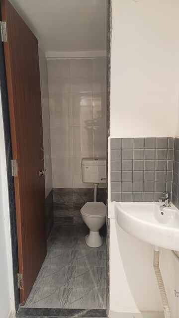 Bathroom in 1.5 BHK Apartment at Vijaylaxmi River Residency, Chikhali – for Rent