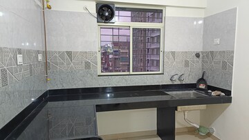 Kitchen in 1 BHK Apartment at RKH Blessings, Moshi – for Rent