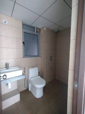 Bathroom in 1 BHK Apartment at Kalpataru Immensa, Kolshet Road – for Rent