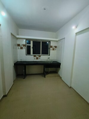 Kitchen in 1 BHK Apartment at Wadgaon Sheri – for Rent