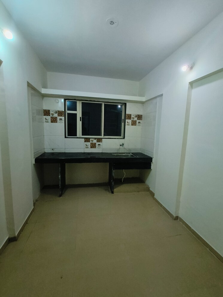 Kitchen, wadgaon sheri 1 Bedroom 615 Sq.Ft. Apartment In Wadgaon Sheri Pune 9603134
