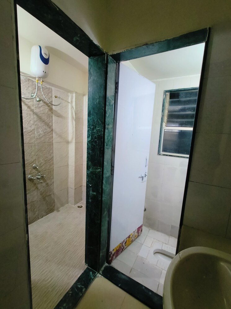 Bathroom, wadgaon sheri 1 Bedroom 615 Sq.Ft. Apartment In Wadgaon Sheri Pune 9603134