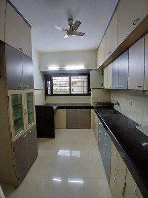 Kitchen in 1 BHK Apartment at Omkar Signet, Malad East – for Rent
