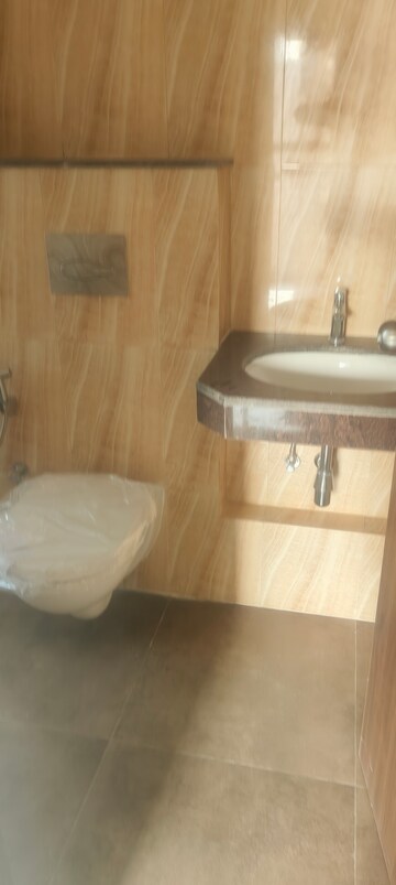 Bathroom in 1 BHK Apartment at Lodha Amara, Kolshet Road – for Rent