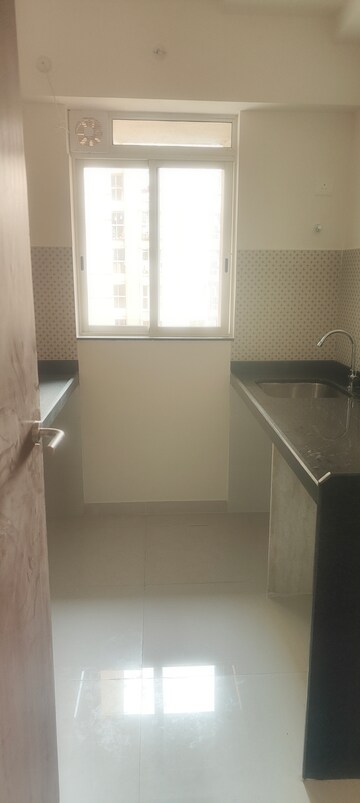 Kitchen in 1 BHK Apartment at Lodha Amara, Kolshet Road – for Rent