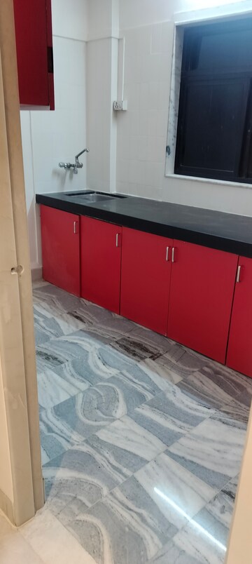 Kitchen in 2 BHK Apartment at Gypsy Rose Apartment, Andheri West – for Rent