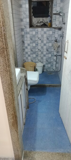 Bathroom in 2 BHK Apartment at Gypsy Rose Apartment, Andheri West – for Rent