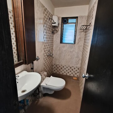 Bathroom in 2 BHK Apartment at Cosmopolis Tower, Andheri West – for Rent