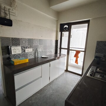 Kitchen in 2 BHK Apartment at Cosmopolis Tower, Andheri West – for Rent