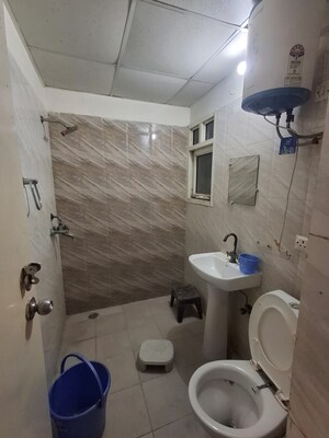 Bathroom in 2 BHK Apartment at Antriksh Golf View, Sector 78 – for Rent
