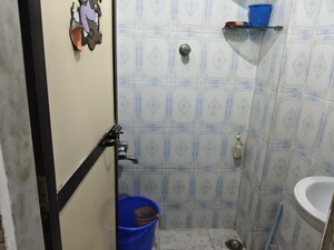 Bathroom in 1 BHK Apartment at Sunshine Tower Koper khairane, Kopar Khairane – for Rent