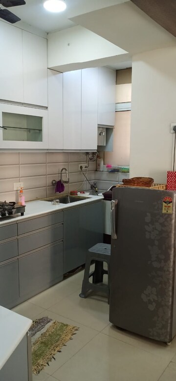 Kitchen in 2 BHK Apartment at Aditya Urban Casa, Sector 78 – for Rent