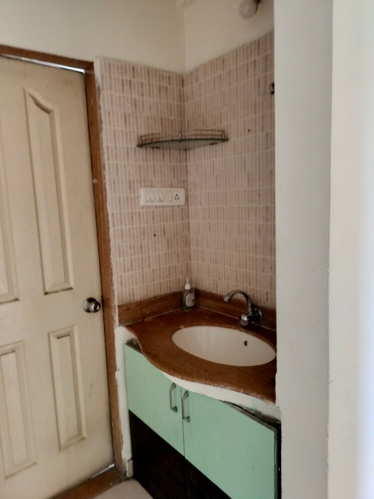 Bathroom, anshul-shree-hans-garden 2 Bedroom 1010 Sq.Ft. Apartment In Dhanori Pune 9604025