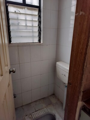 Bathroom in 2 BHK Apartment at Anshul Shree Hans Garden, Dhanori – for Rent