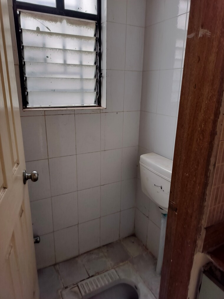 Bathroom, anshul-shree-hans-garden 2 Bedroom 1010 Sq.Ft. Apartment In Dhanori Pune 9604025