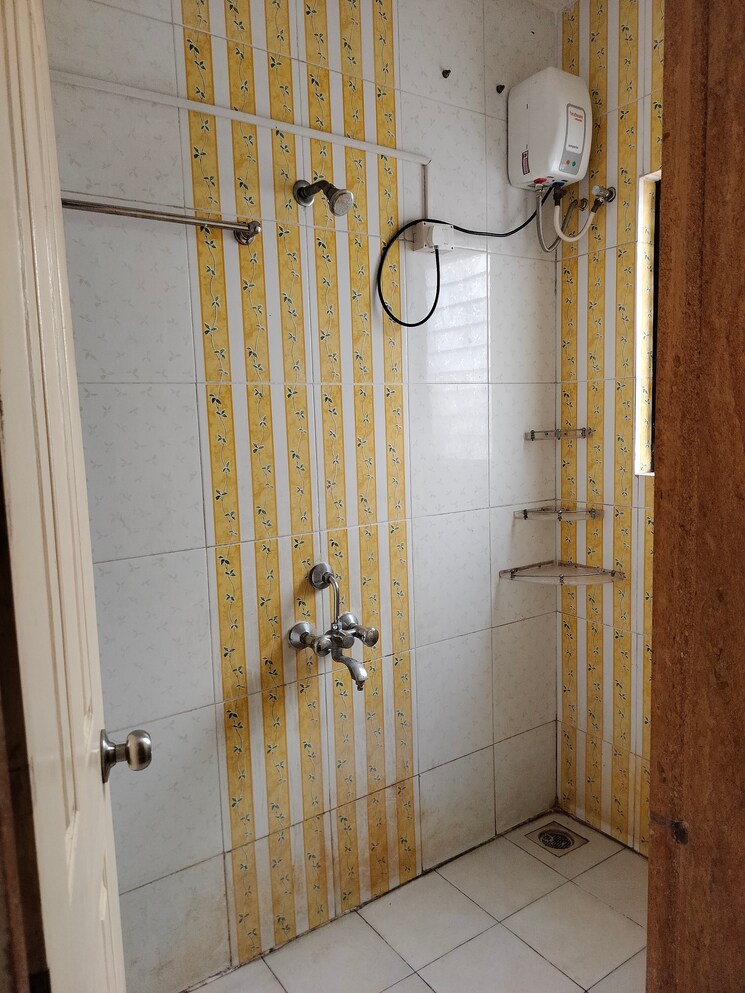 Bathroom, anshul-shree-hans-garden 2 Bedroom 1010 Sq.Ft. Apartment In Dhanori Pune 9604025