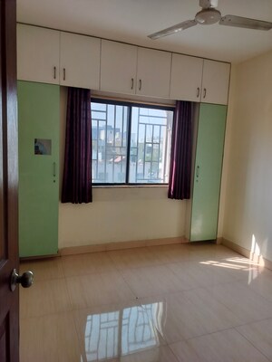 Room in 2 BHK Apartment at Anshul Shree Hans Garden, Dhanori – for Rent