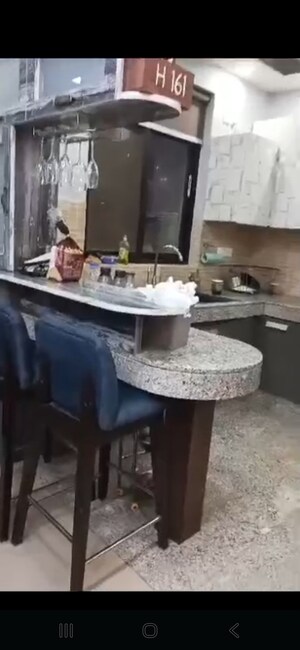 Kitchen in 2 BHK Apartment at Raheja Vedaanta, Sector 108 – for Sale