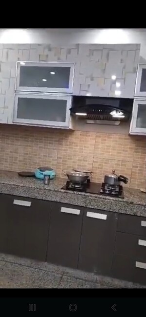 Kitchen in 2 BHK Apartment at Raheja Vedaanta, Sector 108 – for Sale