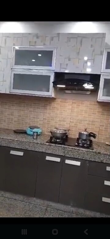 Kitchen in 2 BHK Apartment at Raheja Vedaanta, Sector 108 – for Sale