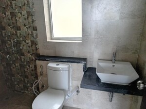 Bathroom in 2.5 BHK Apartment at Mahagun Marvella, Sector 78 – for Rent