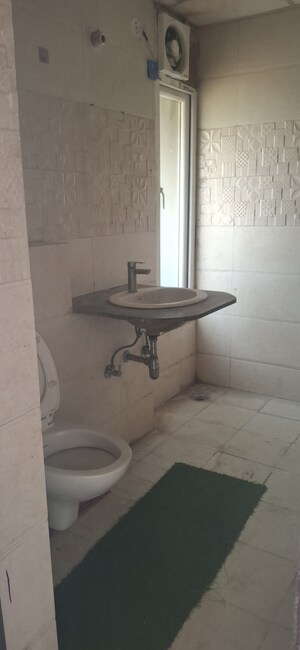 Bathroom in 2 BHK Apartment at Supertech The Romano, Sector 118 – for Rent