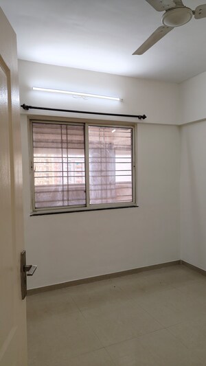 Room in 2 BHK Apartment at Magarpatta City Iris, Hadapsar – for Sale